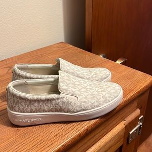Micheal Kors Slip on sneakers.